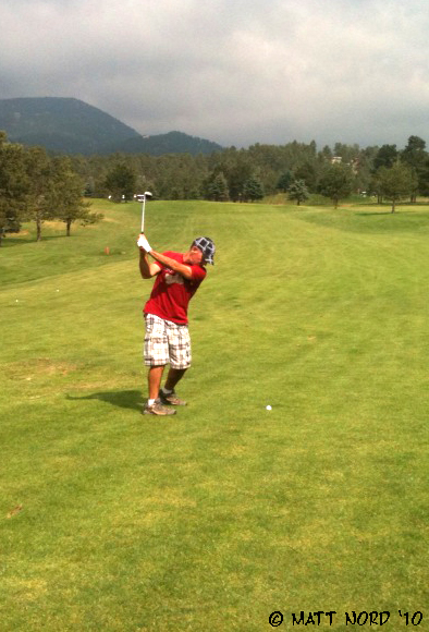 Paul golfing