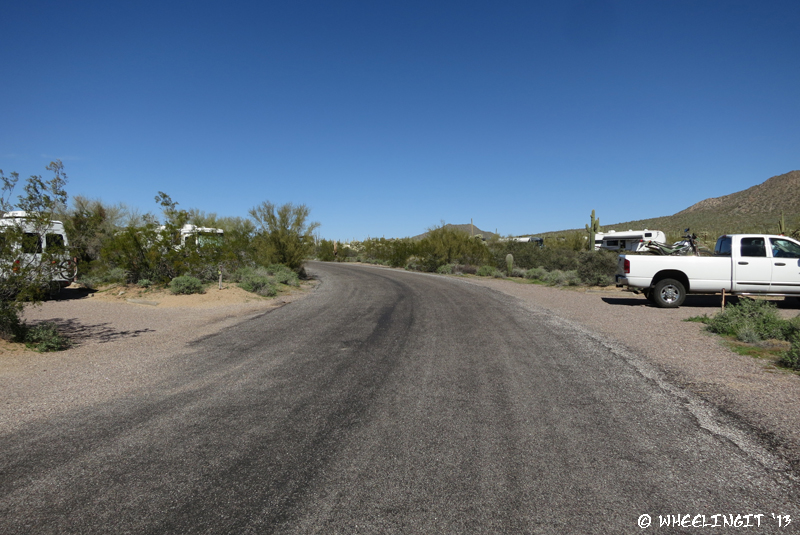 View down middle of loop. Site #64 on left with truck in #65 on right.