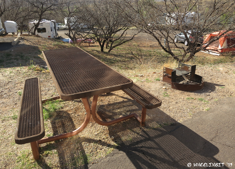 Typical "sitting area" with picnic table and grill.