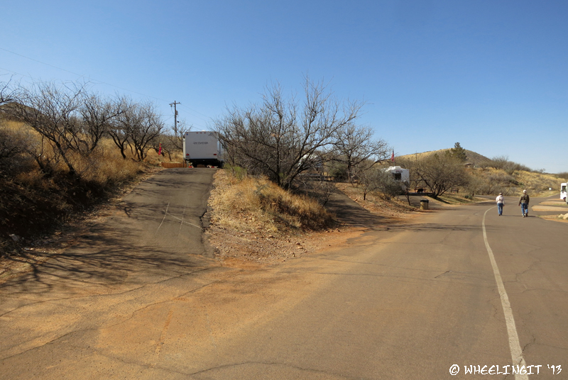 View of the "crazy" sites in East Campground. RV in #5 on left w/ #4, #3 behind. These are so steep we couldn't possilbly get in. Nice views though.