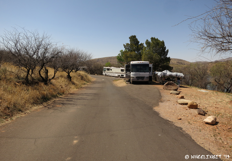 View towards far back of East Campground. RV in #10 on right with #15 behind. Lots of privacy here, but rather uneven.