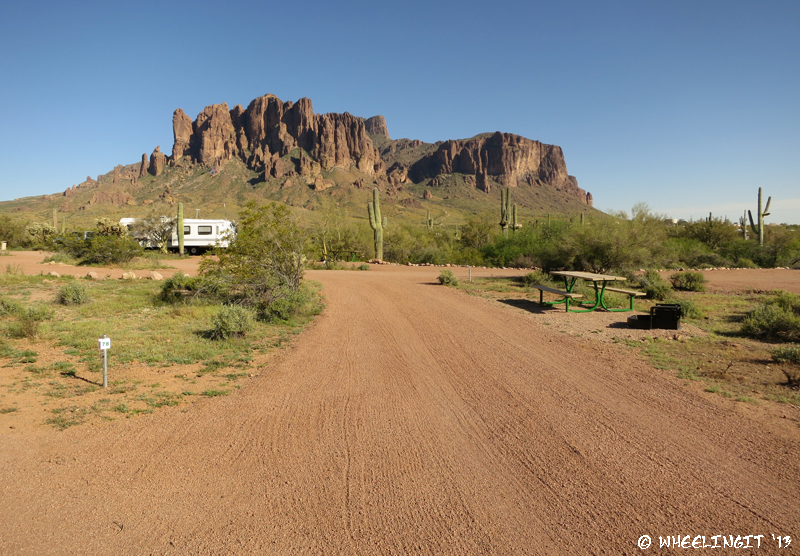 View of pull-through in overflow campground. This is site #78. RV in site #98 behind.