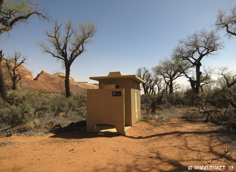 View of on-site pit toilet
