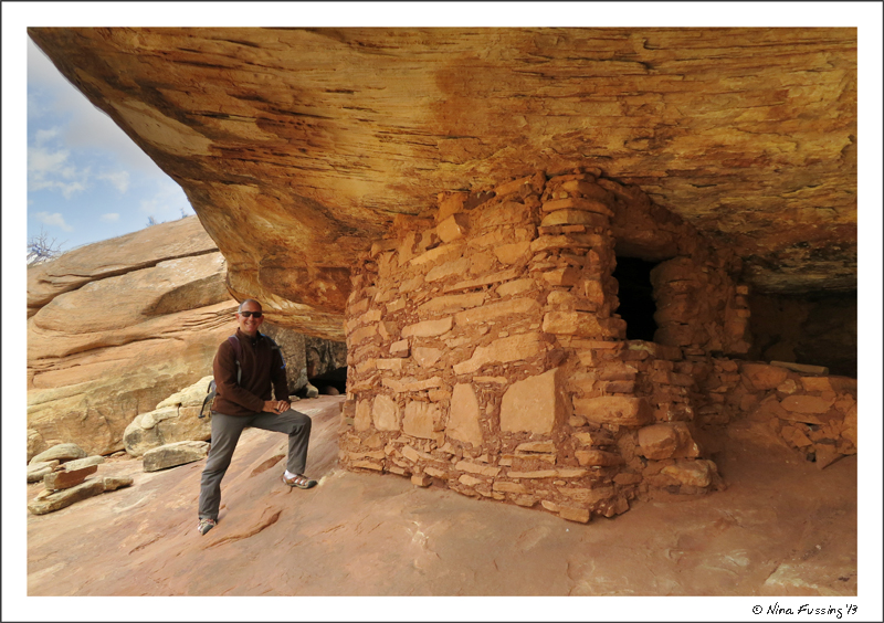 Paul poses by a ruin in Mule Canyon