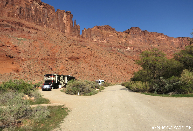 Back view of our site from the main campground road. RV in pull-through #10 behind it.