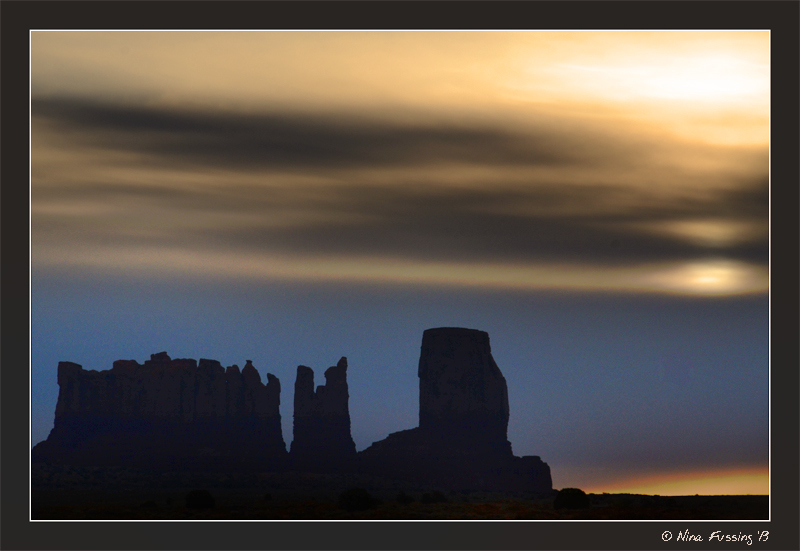 Sunrise in heavy cloud over the Monument Valley Buttes