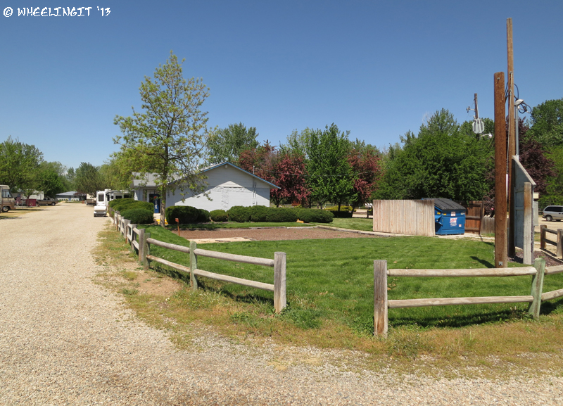 View of facilities in middle of park (laundry, showers and playground)