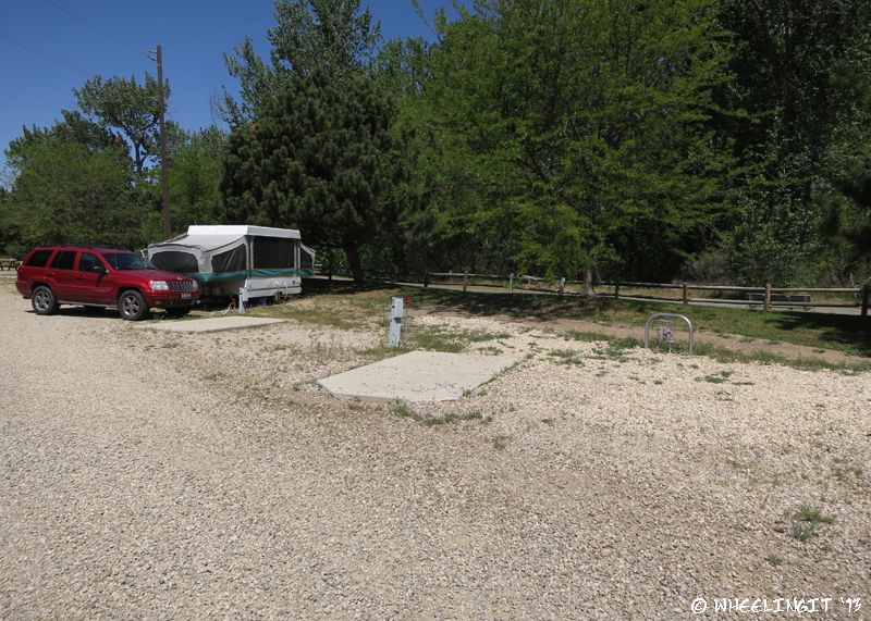 View down front greenbelt-facing water/electric sites. Mostly smaller rigs here.