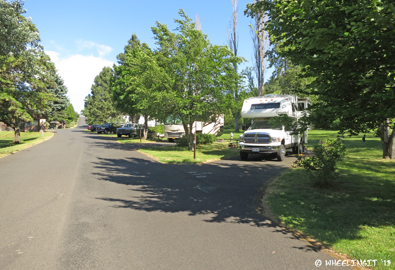 View down back of campground (nearest I-84). This is site A10 with A9, A8 to left. Full hookups, but too much noise for me here.