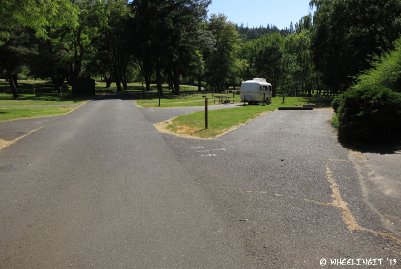 Another view down middle. Empty site B15 with RV in B13 behind. These have hookups.