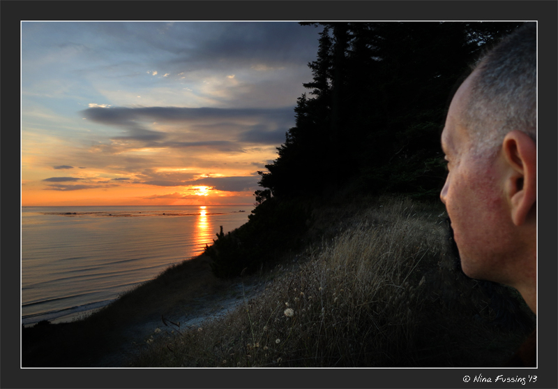 Paul contemplates the sunset on a calm night