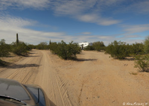 Main road into the wash. RV in a site on the right