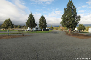 View of top level of RVs. Site #22 on left. RV in site #23.