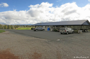 View of club-house with driving range in back.