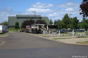 View down our row from the side. First empty site is #254 and we're in #250. The building in the background is the Evergreen Aviation & Space Museum.