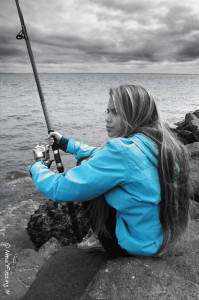 A touch of blue on a grey day. Fishing on the pier at Cape D.