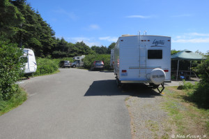 View down front, sunny side of E-loop. RV in site E7 on right, E8 on left.