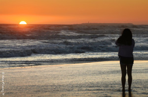 An aspiring photographer catches last rays at Kalaloch