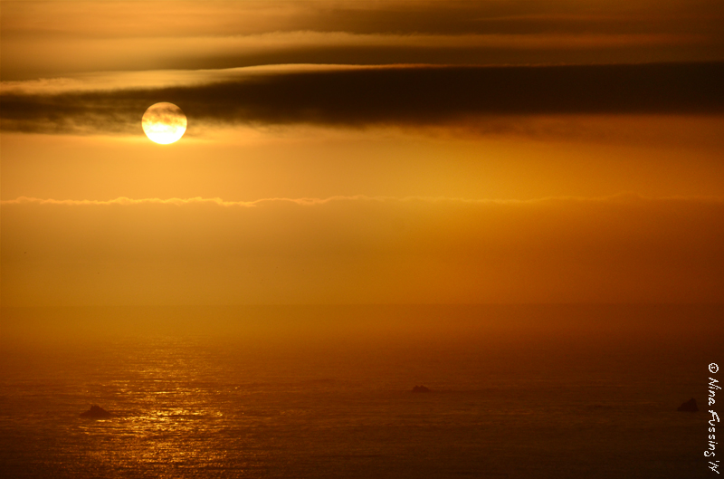 Fiery red sunset at Cape Blanco