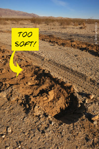 Deep tire tracks are evidence of soft ground. NOT a good spot for "the beast"