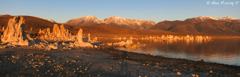 The first intense orange glow on the tufa's